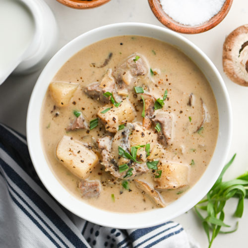 Overhead photo of creamy steak and mushroom soup.