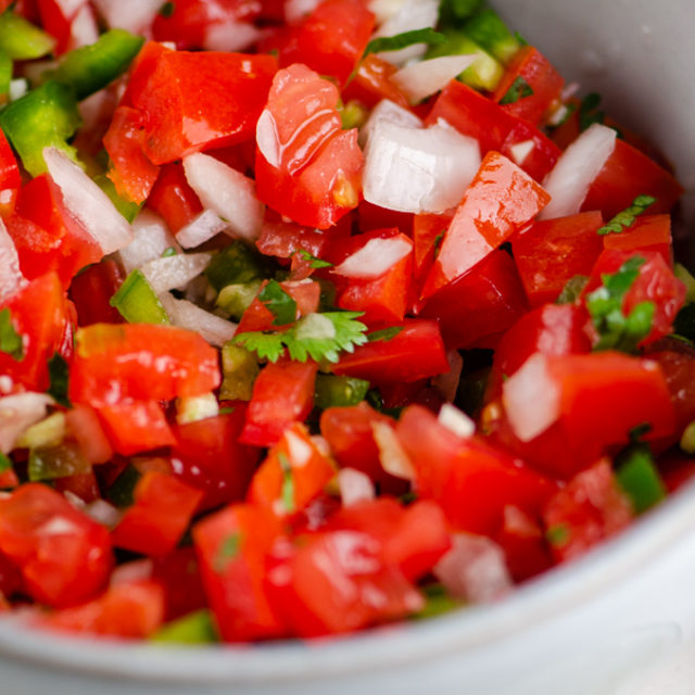 Closeup of pico de gallo in a bowl.