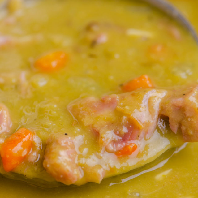 A ladle of split pea soup.