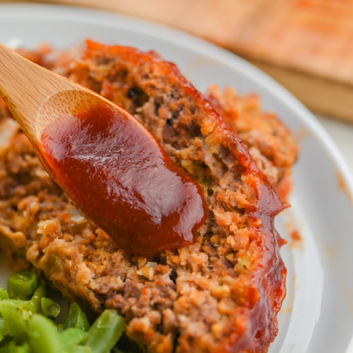 Sriracha Meatloaf on a white plate.