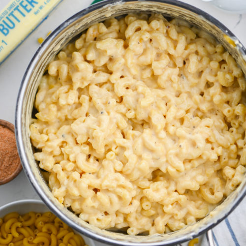 Stovetop mac and cheese in stainless steel pot.