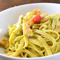 bowl of avocado pasta with shrimp