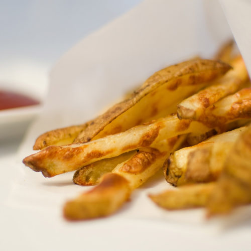 oven baked french fries in parchment paper.