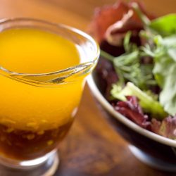 ginger dressing in a small carafe