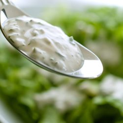 green goddess dressing on a spoon