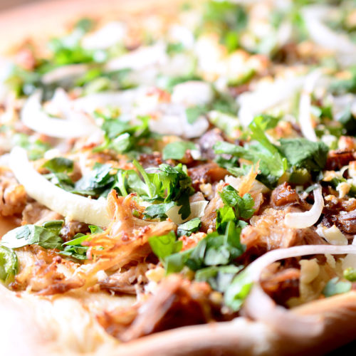 close up of pulled pork pizza