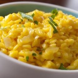 Risotto Milanese in white bowl