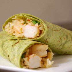 Thai prawn wrap on white plate.