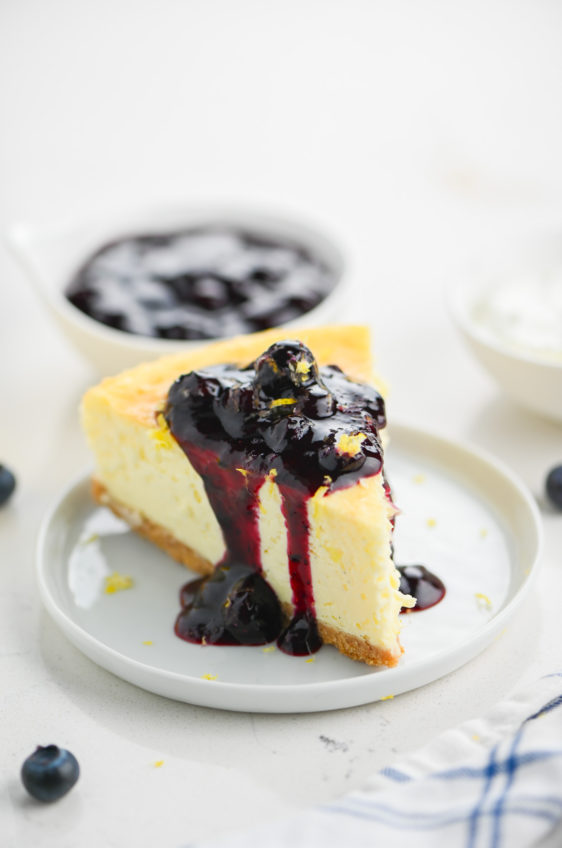 Vanilla Bean Cheesecake with Blueberry Sauce