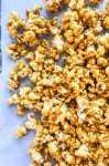 Bourbon Caramel Corn is THE snack you need to have for all of your baseball watching this summer. Popcorn coated in a sweet caramel made with Brown Sugar Bourbon is an addicting snack! 