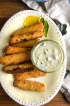 This Tartar Sauce Recipe is beyond easy and not to mention delicious. With just a few ingredients you can make your own and you'll never buy the pre-made stuff again! 