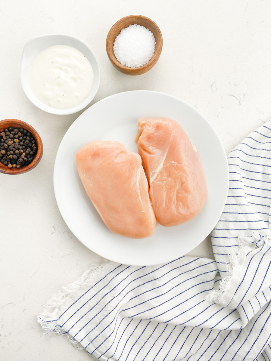 Air fried chicken breast ingredients on white background. 