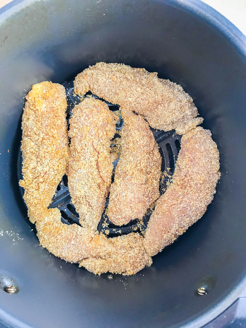 cook chicken tenders in a single layer in an air fryer. 