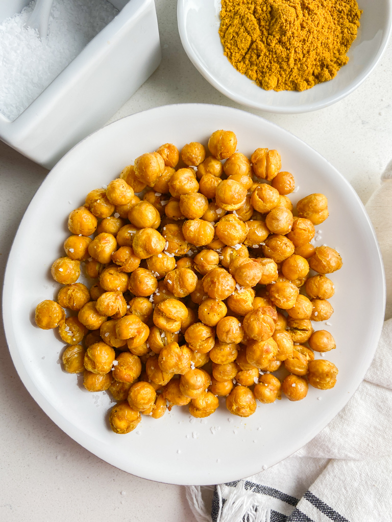 Overhead photo of air fried chickpeas on a white plate. 