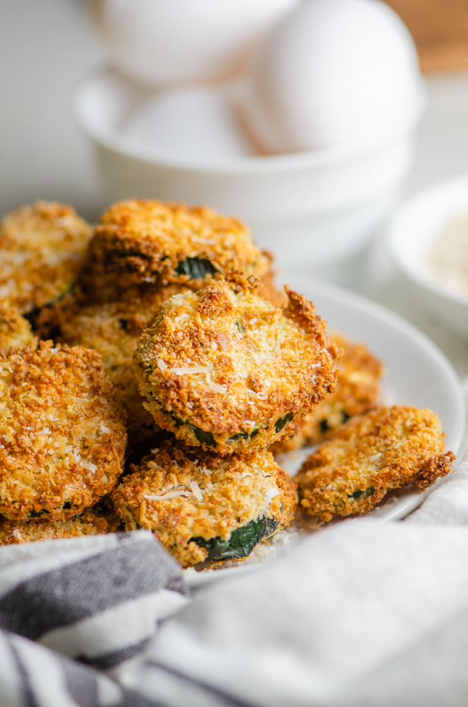 Close up side angle photo of air fryer zucchini chips