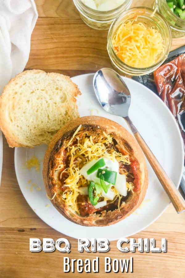 #ad BBQ Rib Chili Bread Bowls, with all of your favorite toppings, are a hearty meal to serve on cool days. They are a must for game day parties too! #breadbowl #chili #chilibreadbowl 