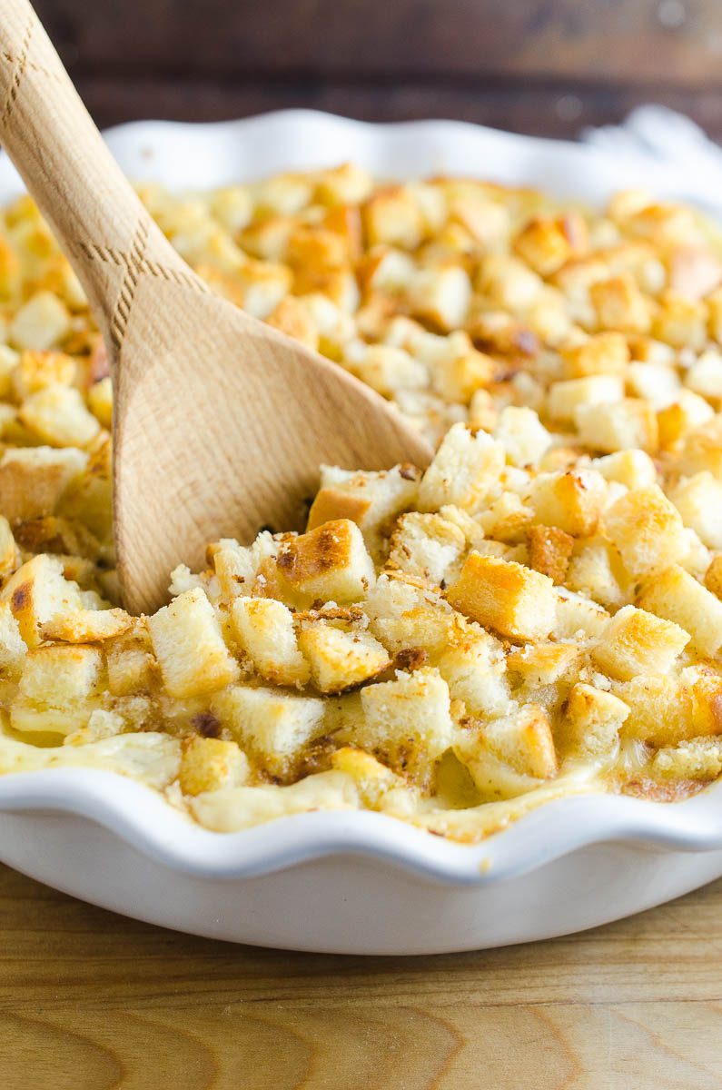 Oven Baked Macaroni And Cheese is a classic comfort food side dish. This easy mac n' cheese recipe is creamy and cheesy, topped with bread crumbs and baked.