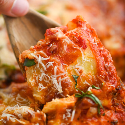 Spoonful of baked ravioli.