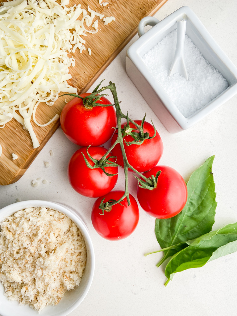 overhead photo of ingredients needed to make stuffed campari tomatoes. 