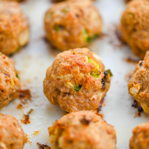 baked turkey meatball in baking dish.