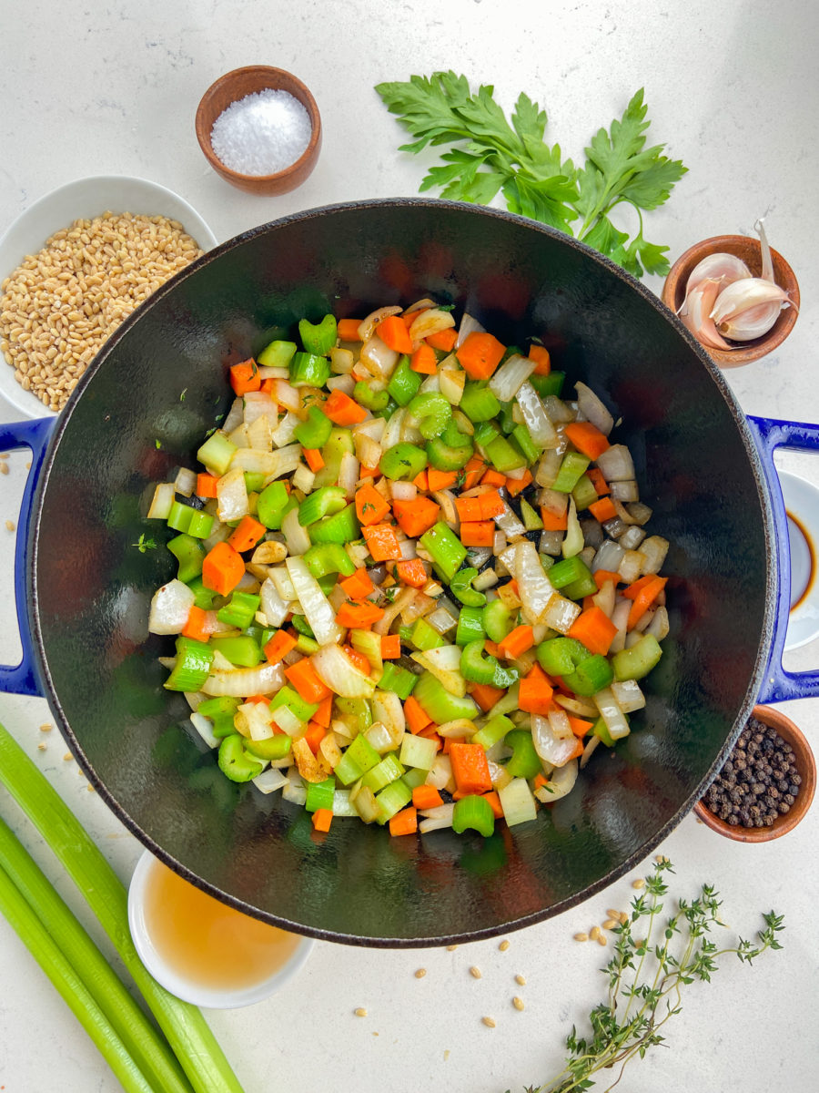 Sauteing vegetables in pot. 