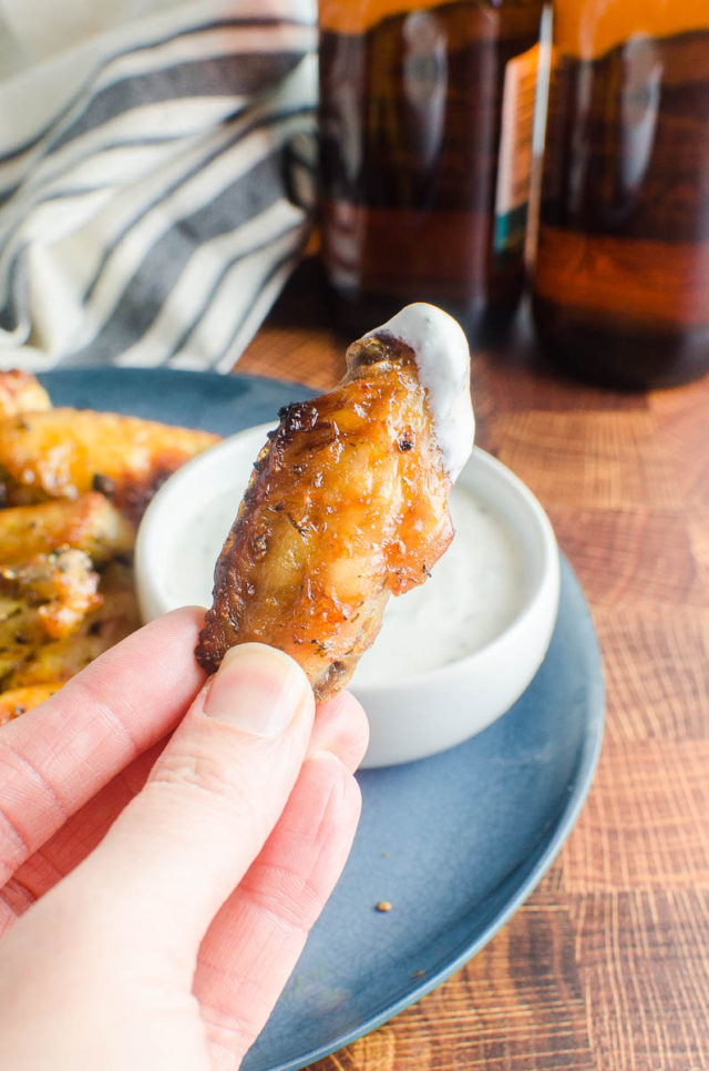 A beer brined chicken wing with ranch dip. 