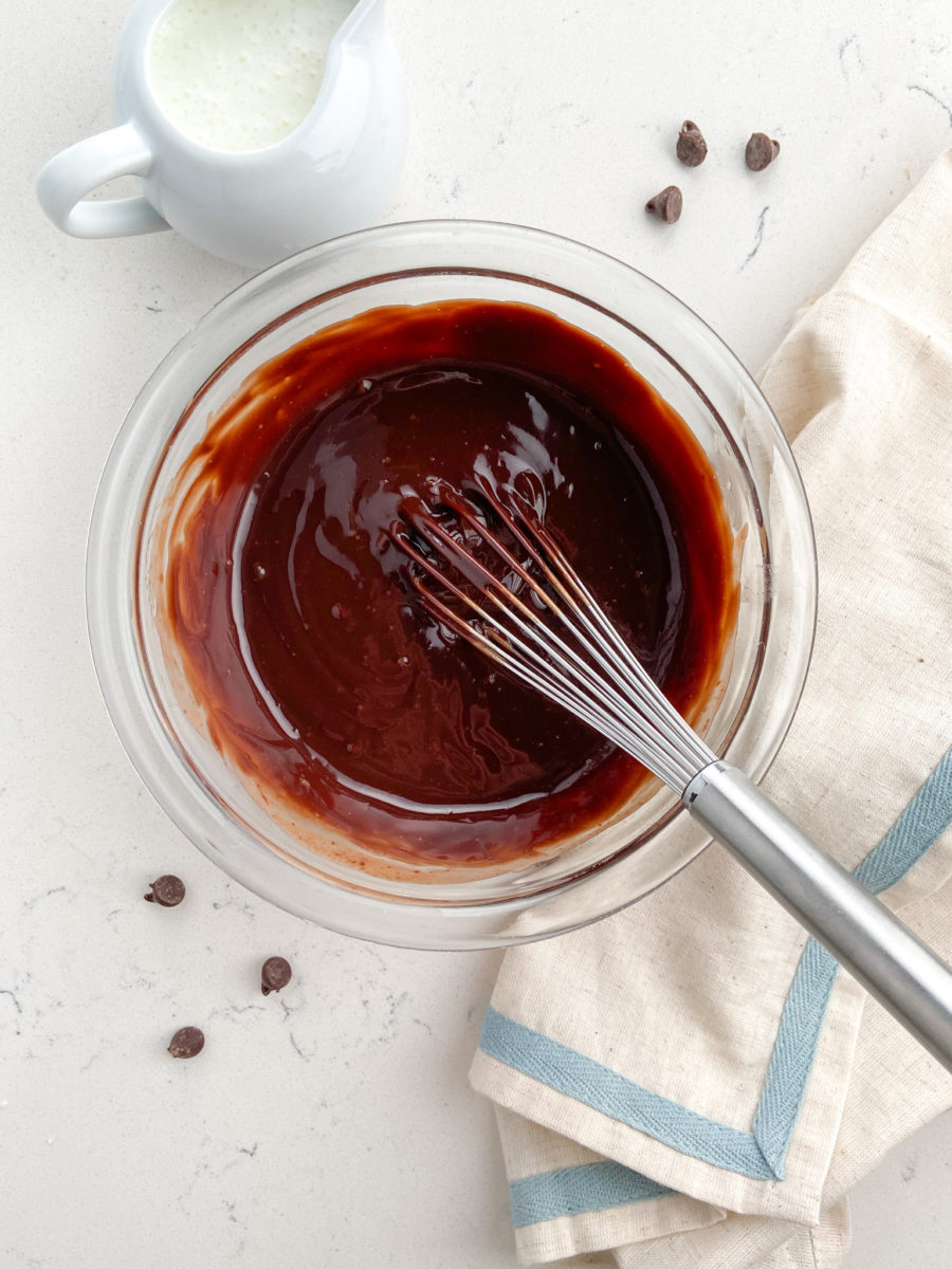 Chocolate ganache in glass bowl.