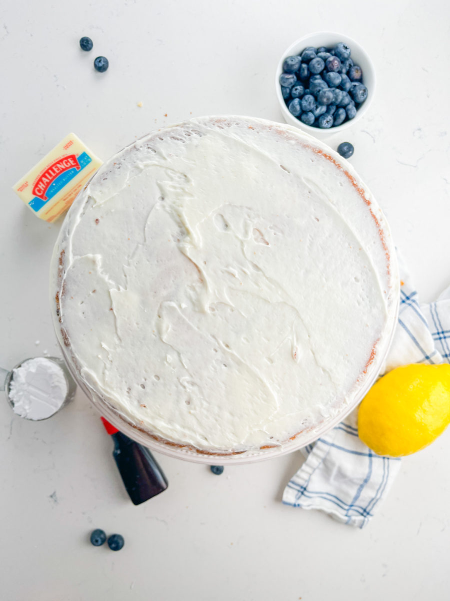 Lemon Blueberry Cake with crumb coat. 