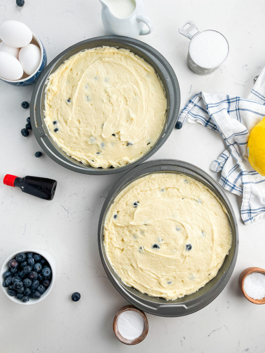 Lemon Blueberry Cakes in 2 round cake pans.