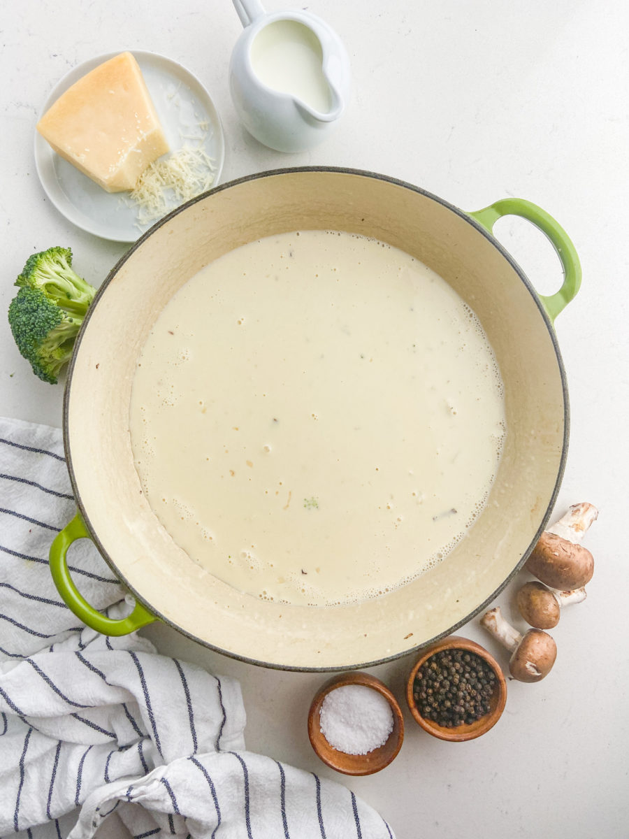 Alfredo sauce in pan. 