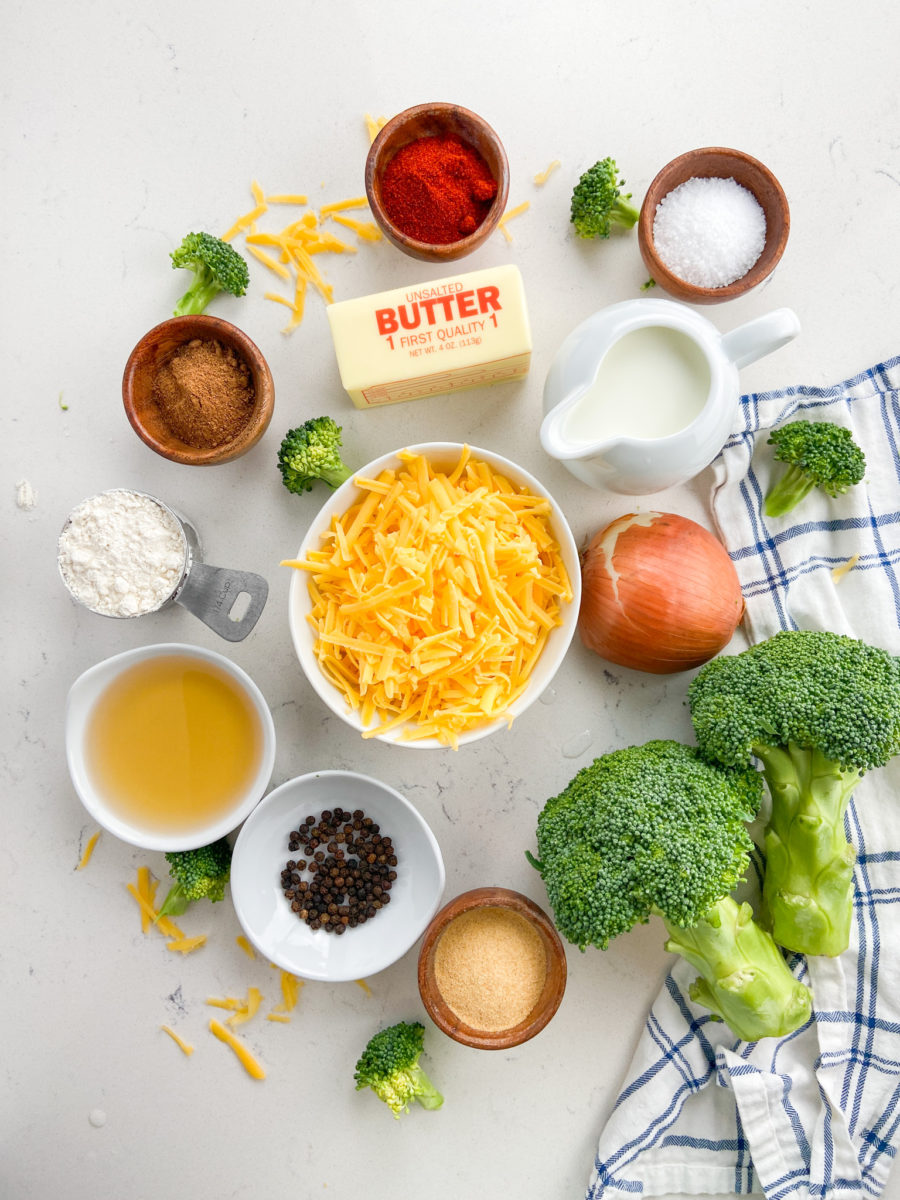 Broccoli cheddar soup ingredients on white background. 