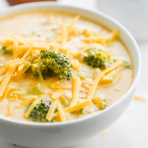 A bowl of broccoli and cheddar soup.