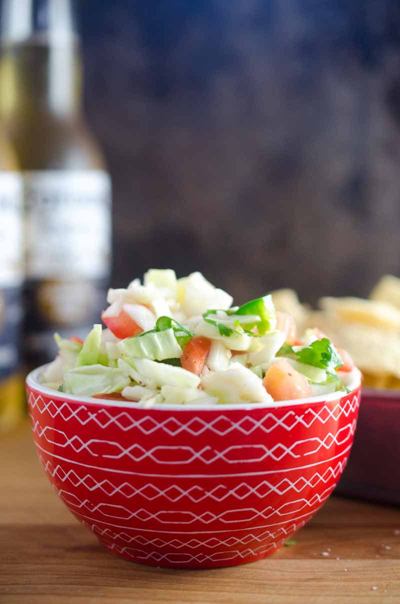 A crisp refreshing Cabbage Salsa with cabbage, onion, tomato, cilantro, jalapeno and lime.