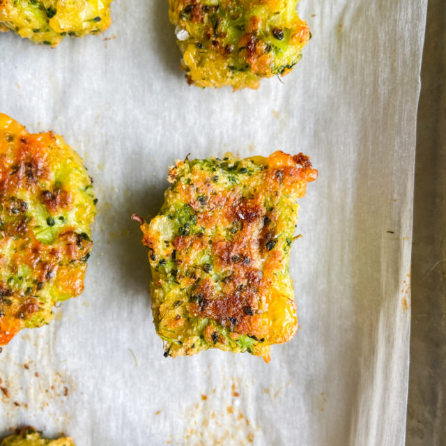 Overhead photo of broccoli tots on parchment paper.