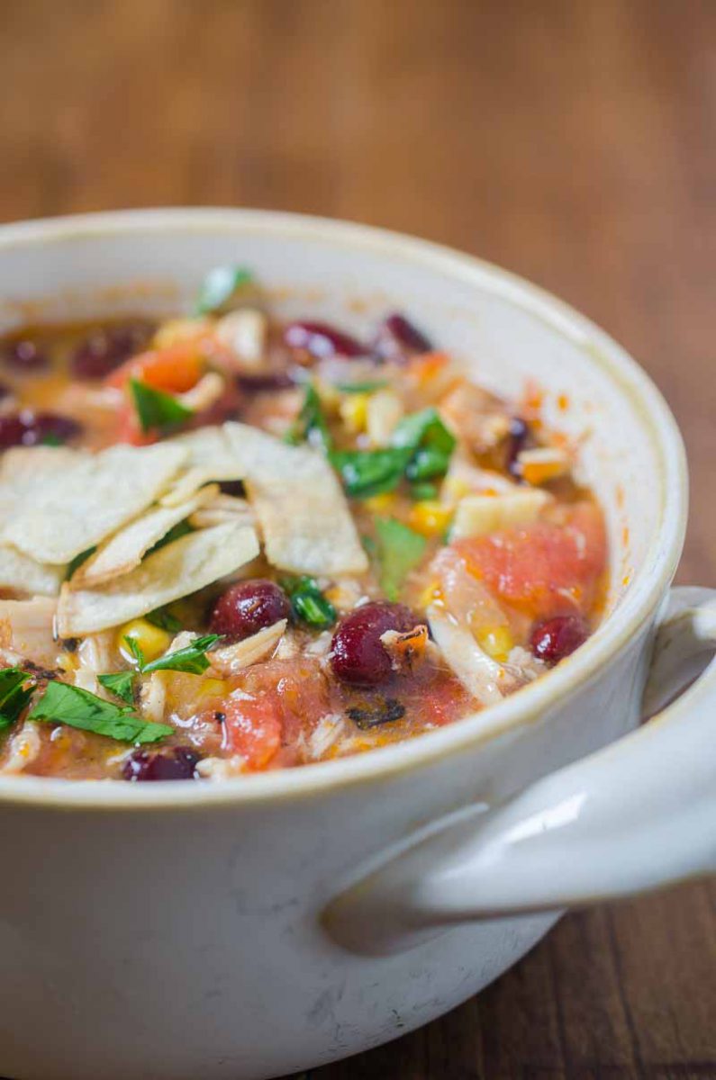 Chicken Tortilla Soup is a classic for a reason. This soup is loaded with tender chicken, beans, corn and fire roasted tomatoes. Sure to warm you up on a cold winter's day! 
