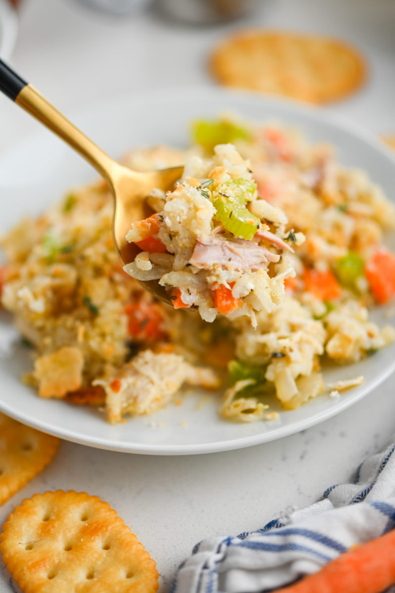 A spoonful of chicken and rice casserole. 