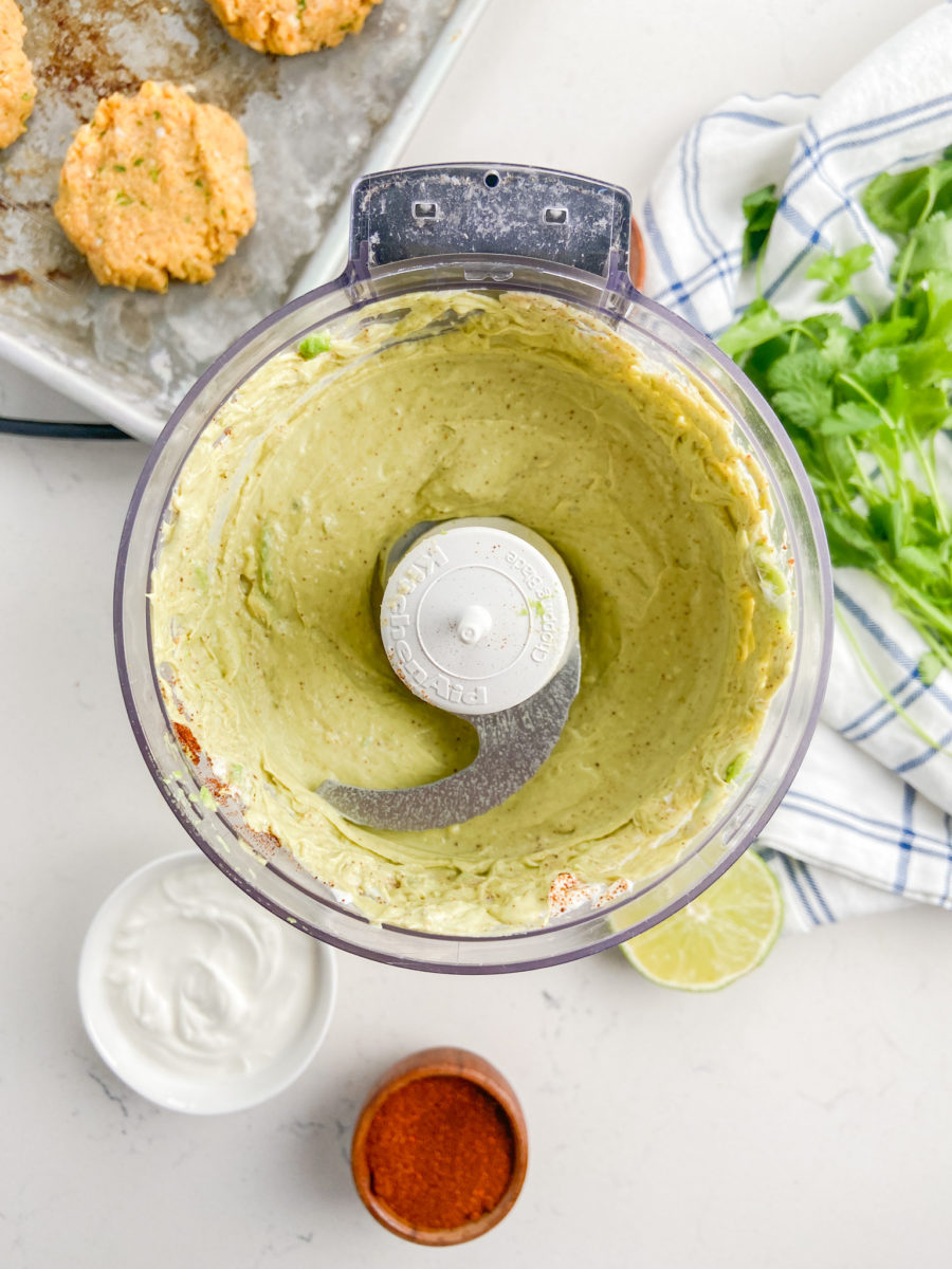 Avocado cream sauce in food processor. 