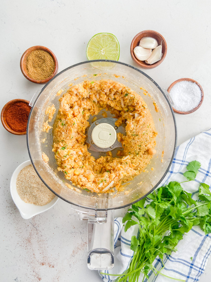 Blended chickpea patty mixture in food processor. 