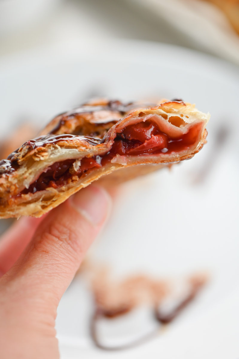 Close up of inside of chocolate cherry turnover. 