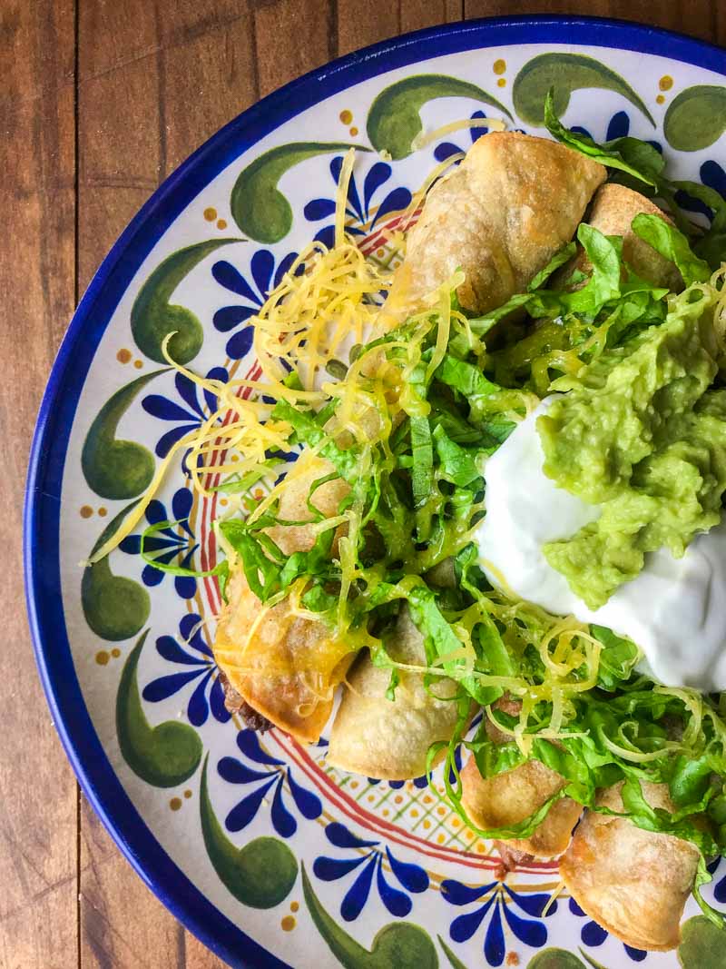 Chorizo & Black Bean Taquitos are crispy oven baked taquitos filled with chorizo, black beans and pepper jack cheese.