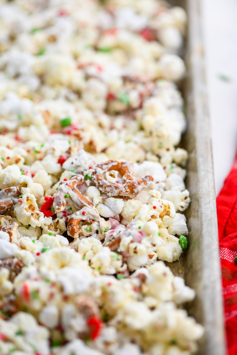 Christmas popcorn on baking sheet.