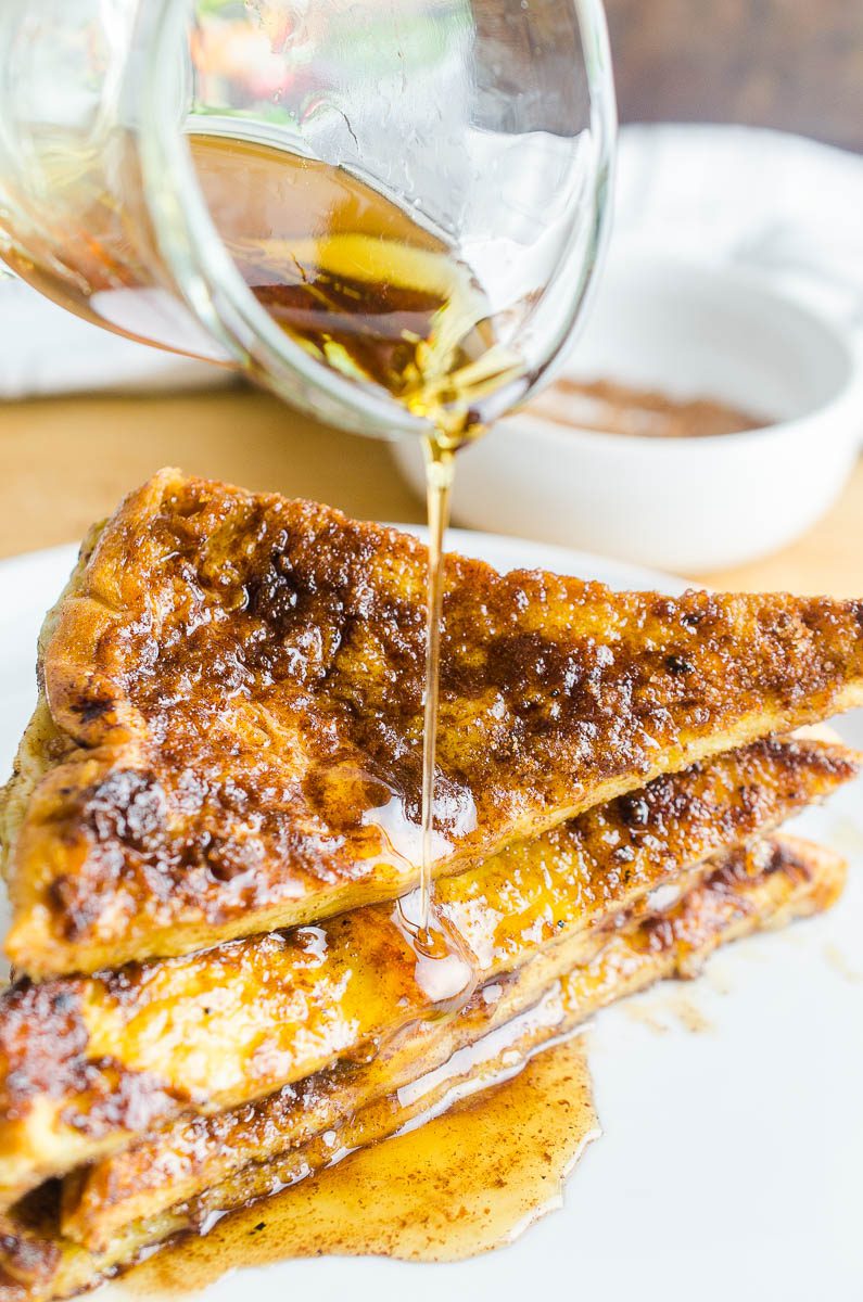 Pouring syrup on easy cinnamon french toast