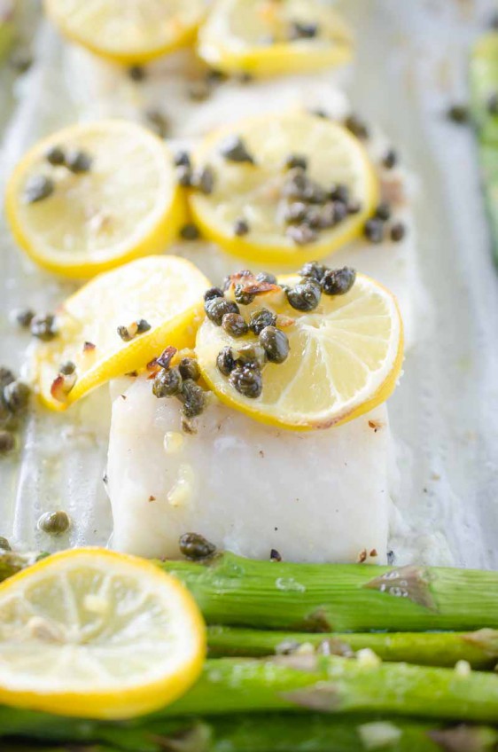 This Cod and Asparagus Sheet Pan Dinner topped with lemons and caper butter just screams easy spring meal!