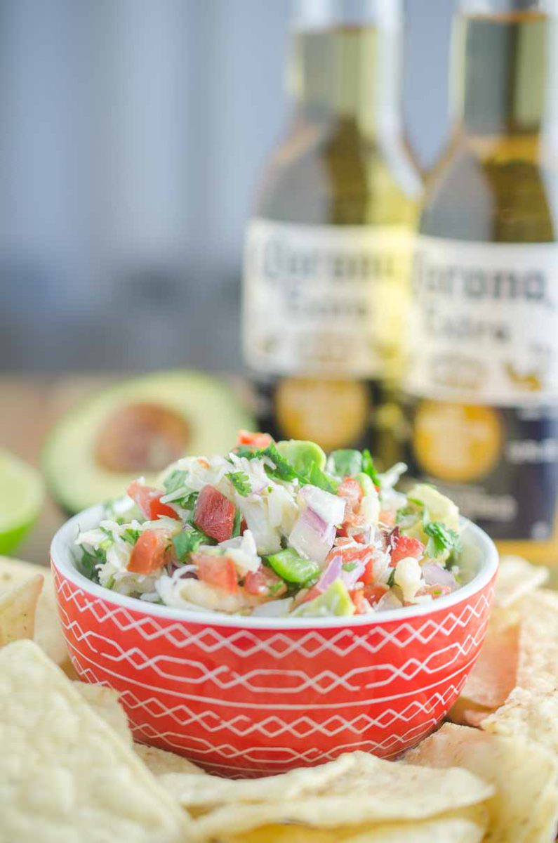 Crab ceviche is a fun twist on a classic! A mixture of Dungeness crab, tomatoes, serrano peppers, onions, lemon, lime, cilantro and avocado. It's like sunshine in a bowl. 