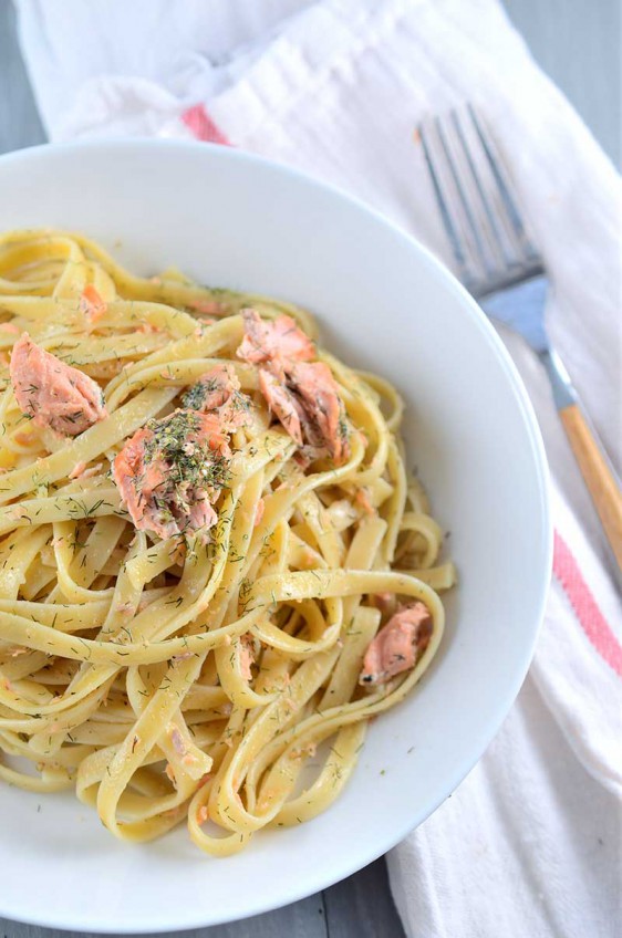 Creamy Dill Salmon Fettuccine made with salmon and white wine cream sauce is quick enough for a weeknight dinner and fancy enough for a date night at home.