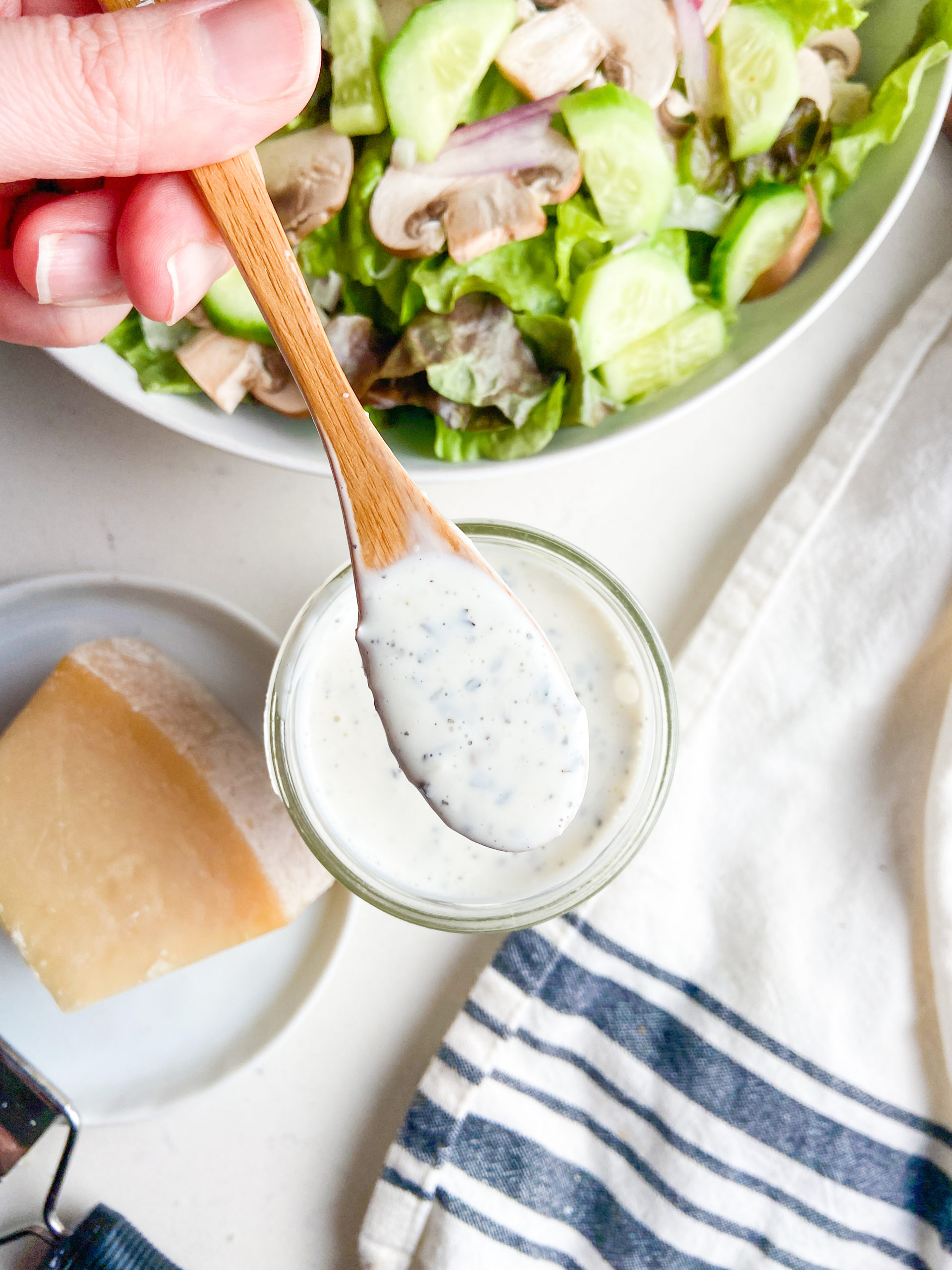 spoonful of creamy pesto dressing.