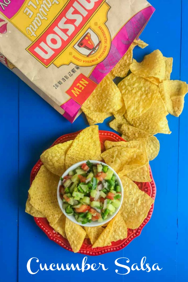 Cucumber Salsa is quick easy and will be your new favorite way to use cucumbers. Only 6 ingredients: cucumbers, lime, tomatoes, cilantro, onion & jalapeño. #ad #cucumber #salsa #missionchips