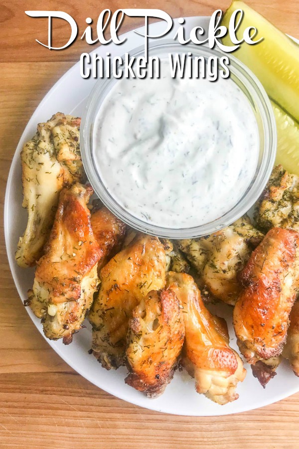 Dill Pickle Chicken Wings will be your new favorite wing! Baked Chicken Wings get a dill pickle twist with pickle brine. The whole family will love these easy baked chicken wings. #dillpickle #chickenwings #ovenbakedchickenwings #bakedchickenwings