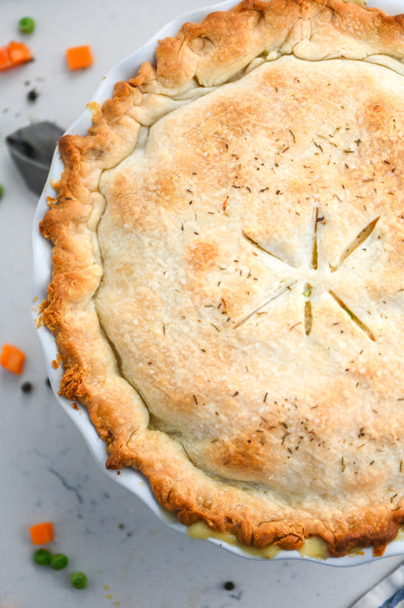 Whole chicken pot pie in pie dish. 