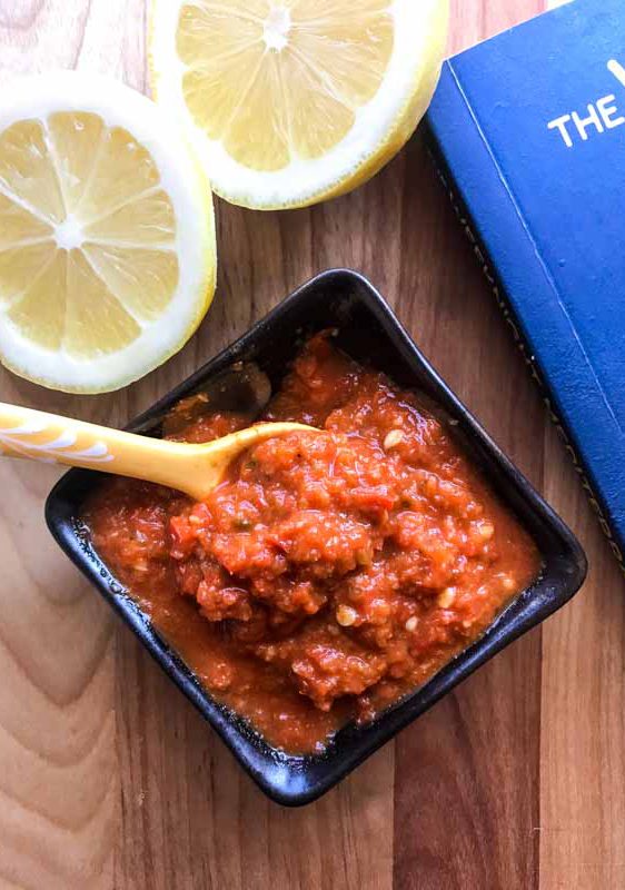 Easy Homemade Harissa is super easy to make. A blend of red bell peppers, fresno peppers and spices, this chile paste is favorite for spice lovers!